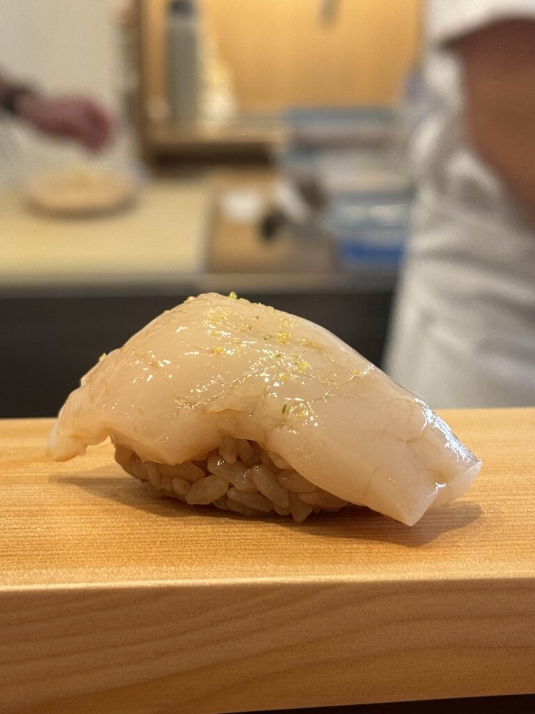 Picture of hotate nigiri from Okonomi inside Mills Market Orlando