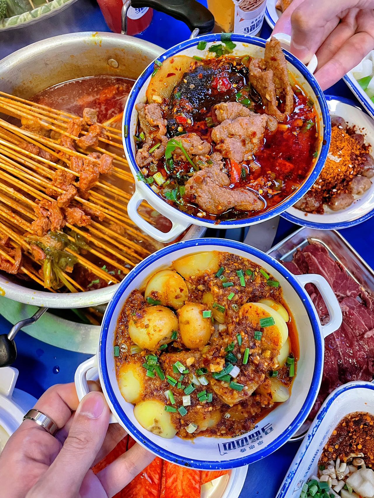 Picture of skewers and side dishes from Ma Lu Bian Bian in Orlando, Florida
